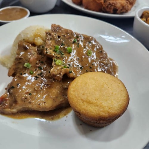Smothered Pork Chops Entree.