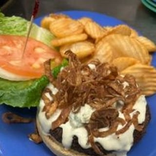 Blackened Bleu Cheese Burger served with Homey Fries