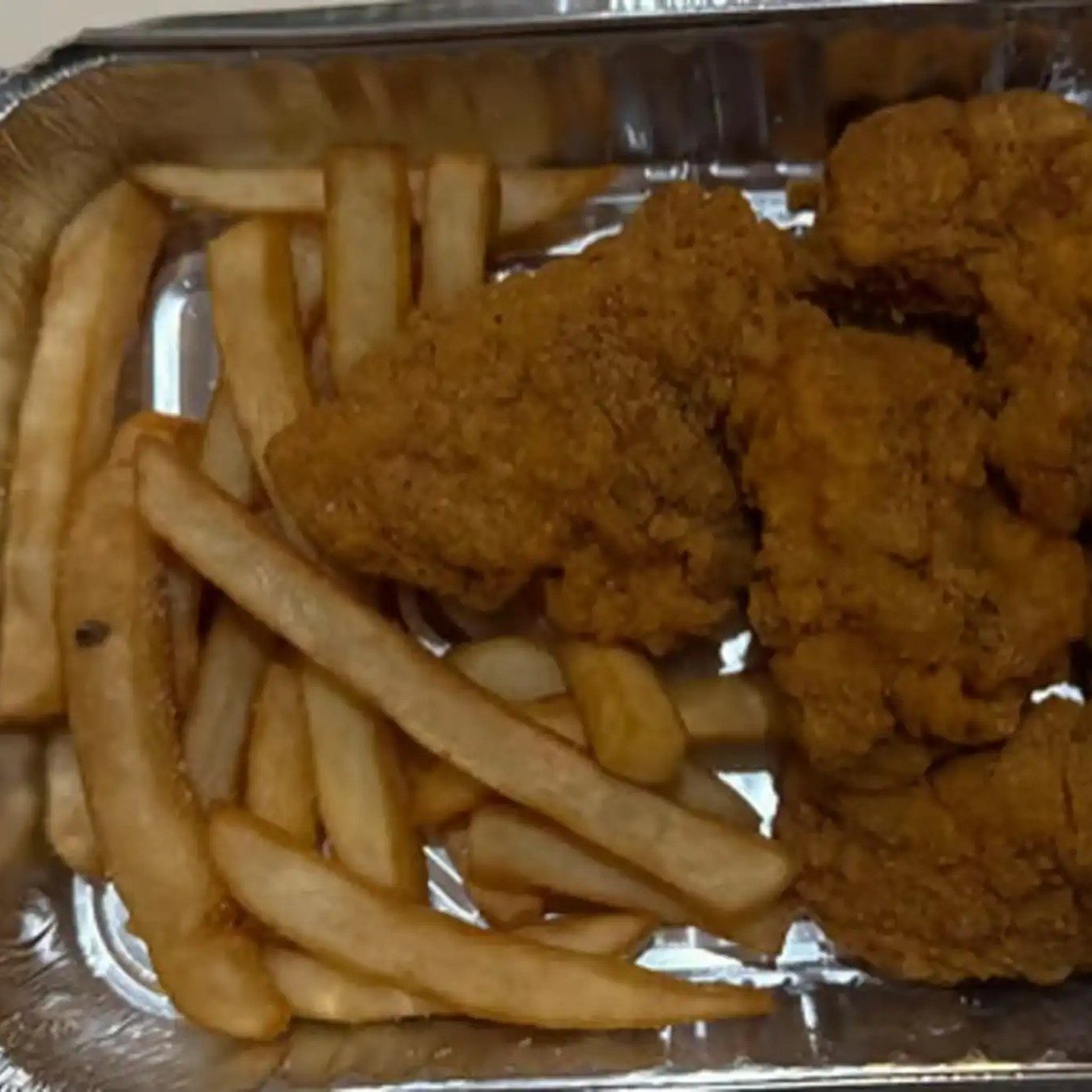 Kids Chicken Fingers and French Fries.