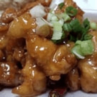 Orange Chicken special ( Includes eggroll,crab rangoon and rice)