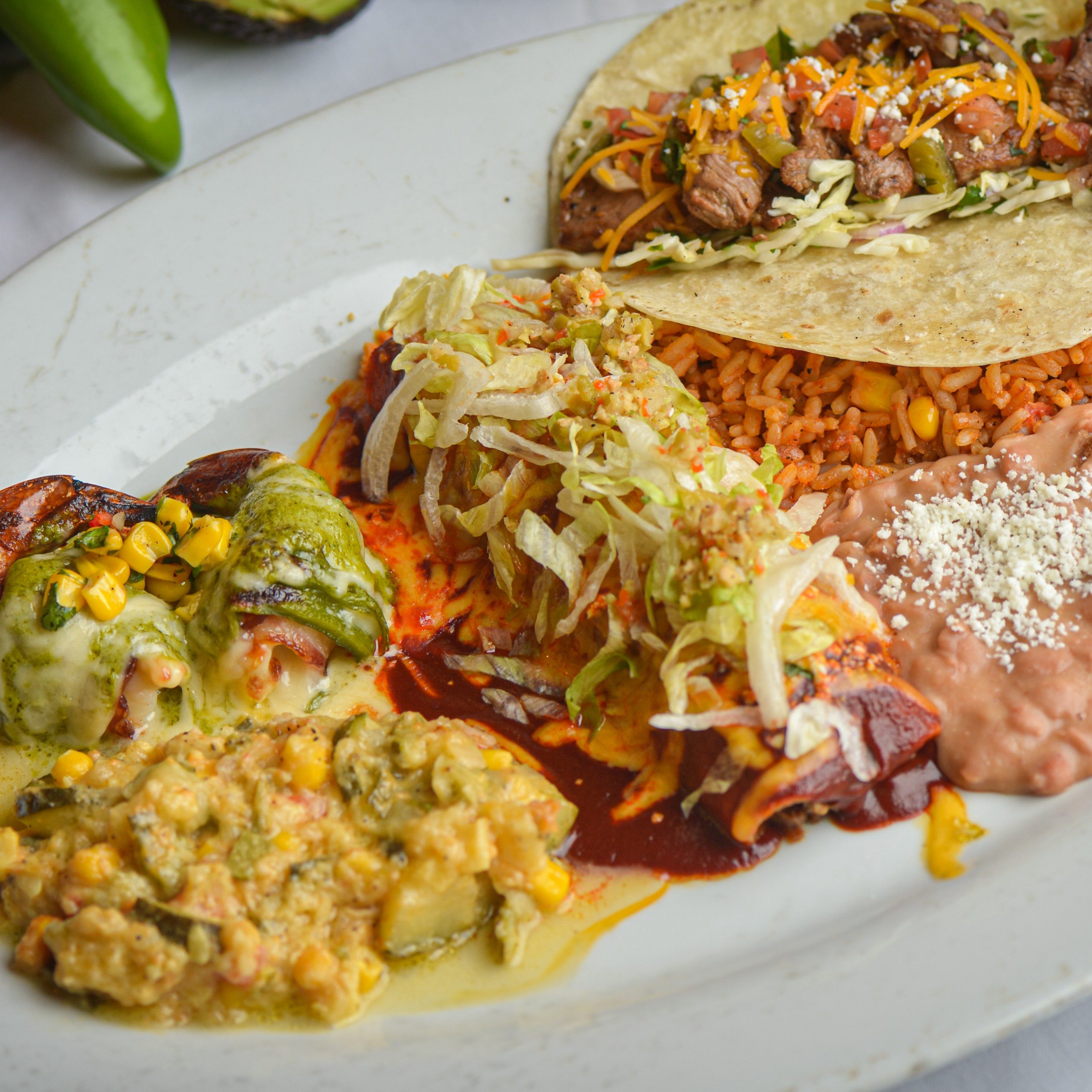 #4 Manchego Shrimp, Carnita Enchilada, Carne Asada Taco.