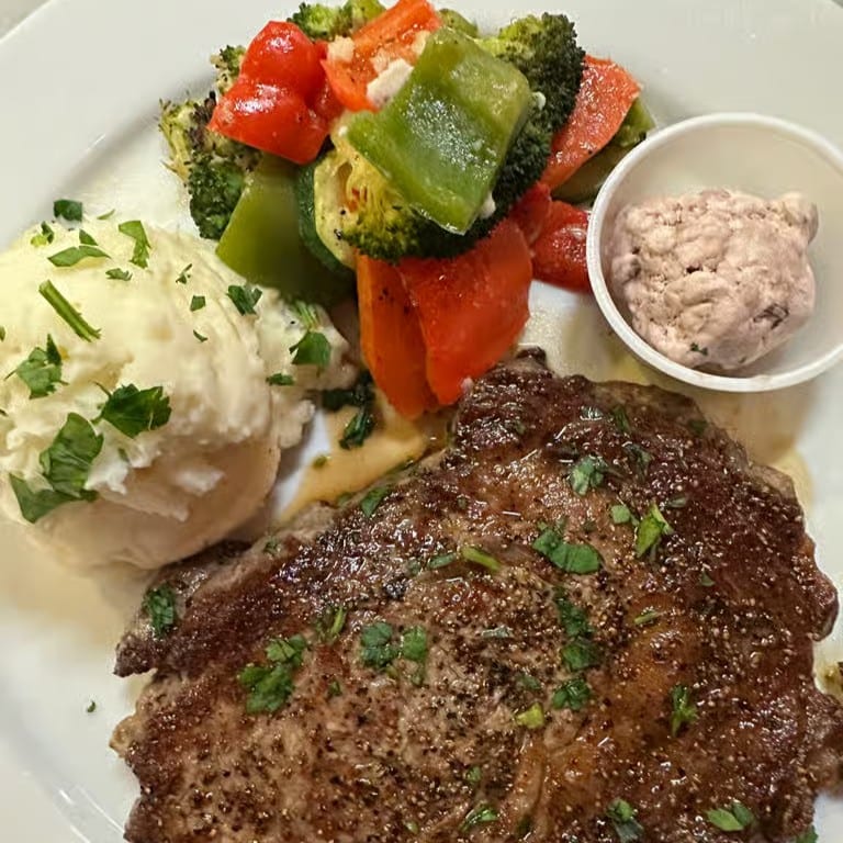 Grilled premium rib eye dinner.