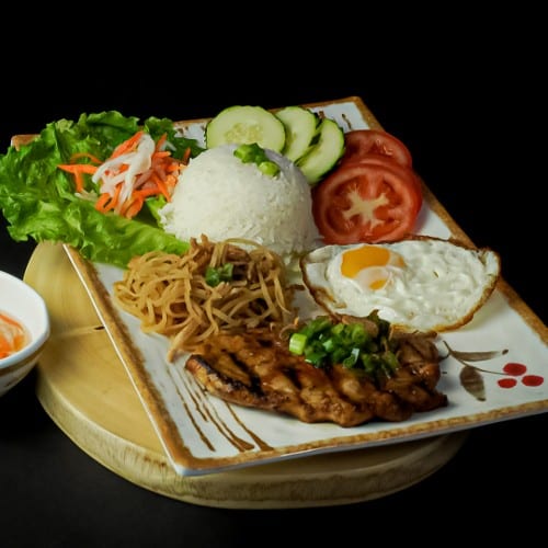 10C Pork Chop, Sunny Side Up Egg, Shredded Pork Rice Dish.