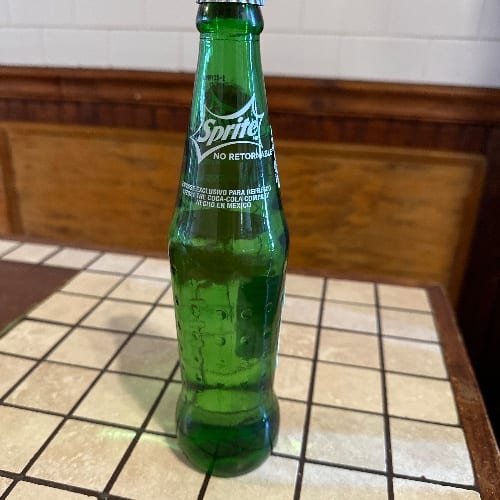 Glass Sprite bottle.