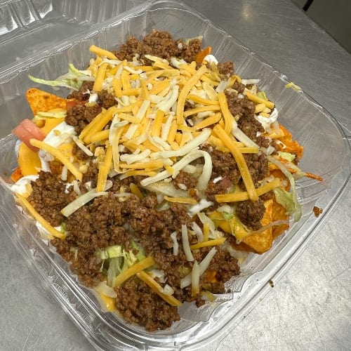 Chicken, Steak or Ground Beef Nachos.