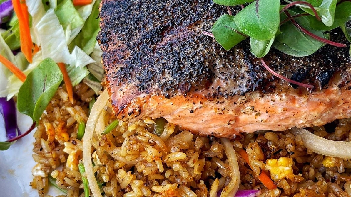 39. Blackened Salmon on Cajun Fried Rice.