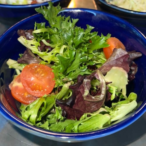 Green Salad with House Vinaigrette.