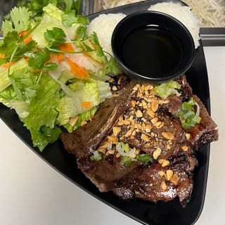 RD5. GRILLED BEEF SHORT RIBS Rice Dish ( COM SUON BO NUONG)