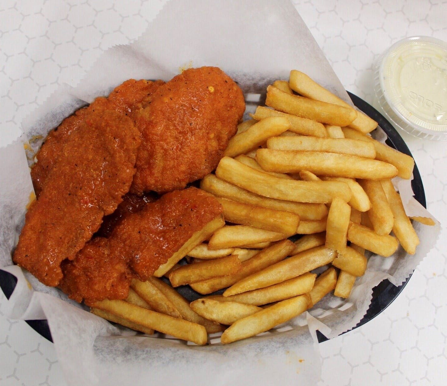 Kid's Chicken Tenders with Fries.