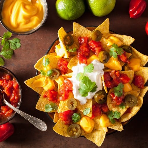 Nachos with Queso Dip & Jalapeños.