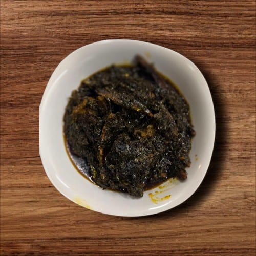 Eru Soup with Yam Fufu or Garri.