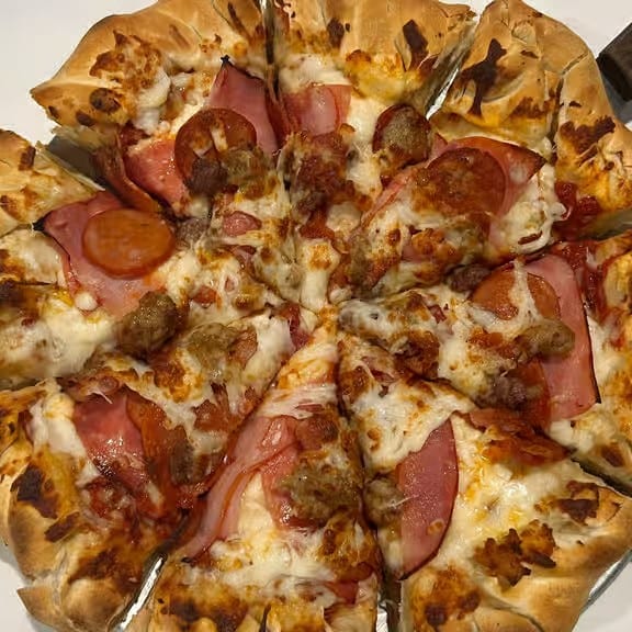 Deep Dish All Meat Combination Pizza.