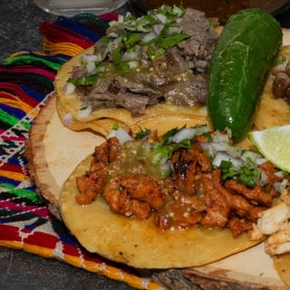 (2) soft tacos w/rice and beans