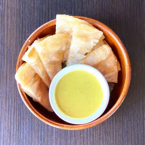 Crispy Roti with Curry Sauce.