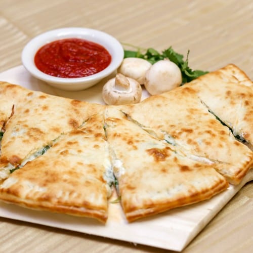 Mozzarella, Ricotta & Spinach Calzone.
