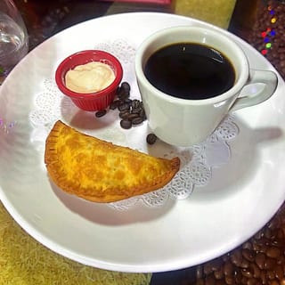 ONE EMPANADA OR CHICKEN TACO WITH COFFEE