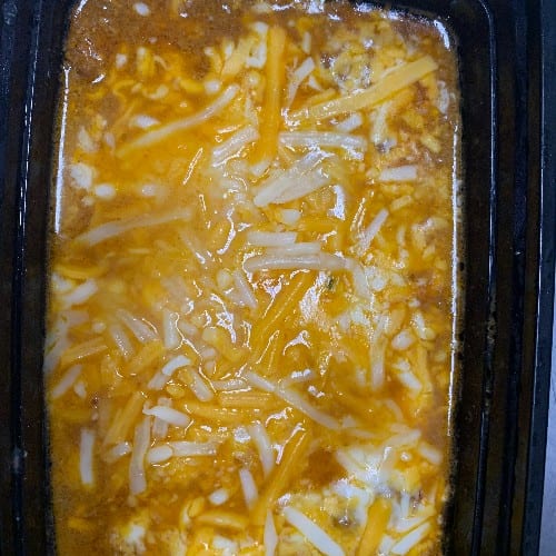 NACHOS WITH GROUND BEEF AND CHEESE.