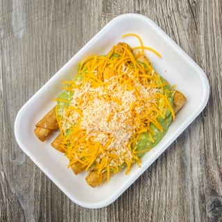 12 BEEF ROLLED TACOS GUACAMOLE