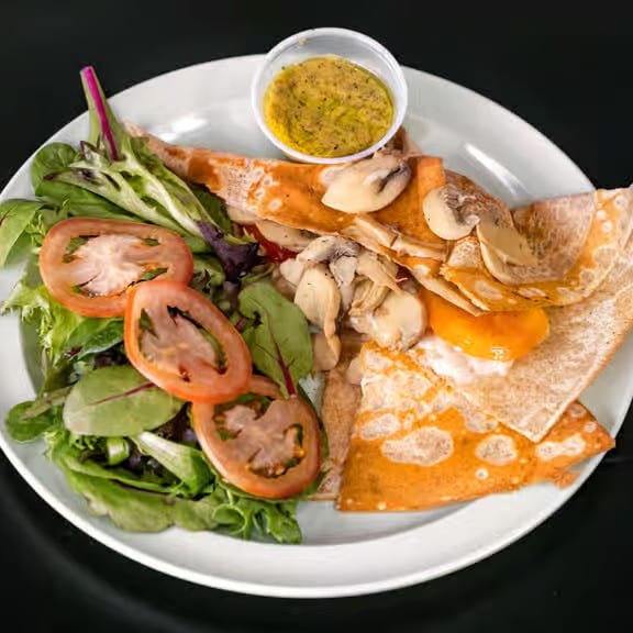 Goat Cheese, Mushroom, and Tomato Crepe.