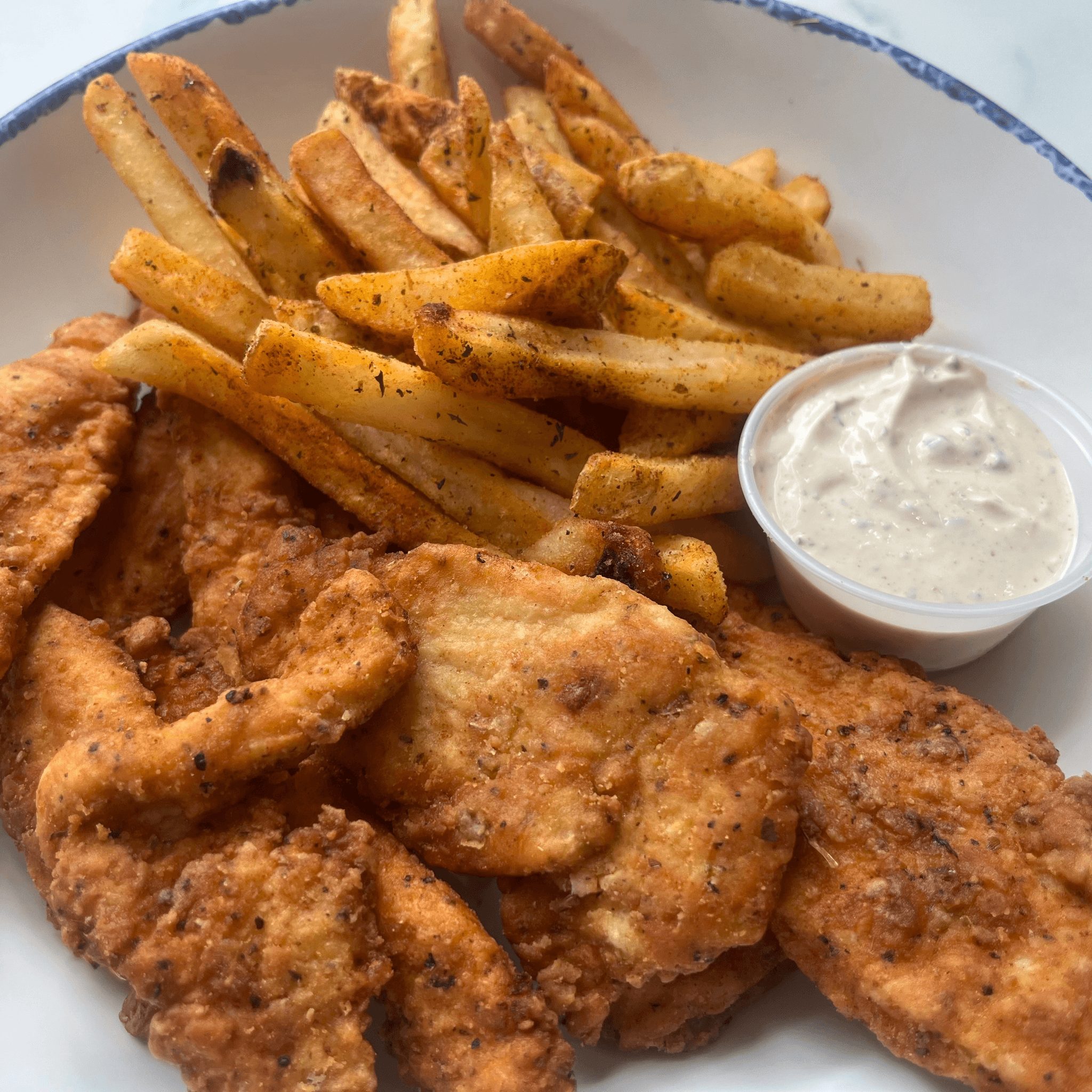 Tazā Chicken Tenders.