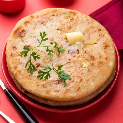 Aloo Paratha (2) with Yoghurt and Pickle.