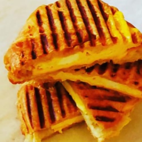 Egg & Cheese Croissant with Hash Brown.