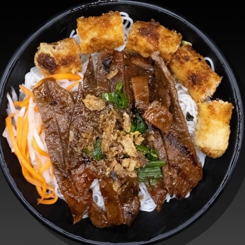 Egg Roll & Grilled Meat Noodle Bowl.