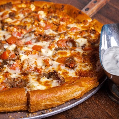 Large Greek Pizza and a Large Greek Salad with a Cup Our Homemade Greek Chicken Lemon Soup.