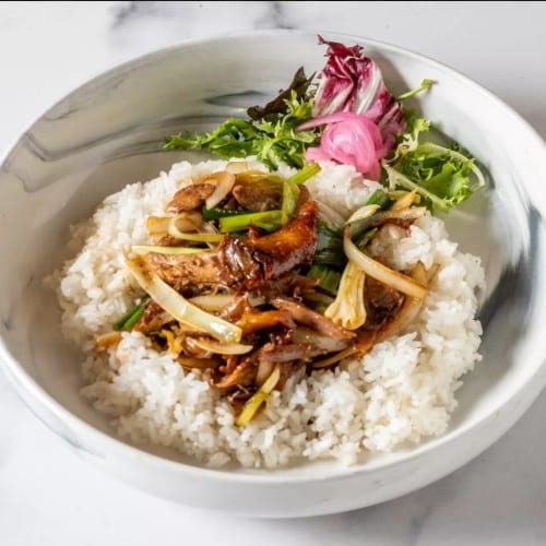 Sliced Duck Sautéed with Ginger & Scallion in Plum Sauce.