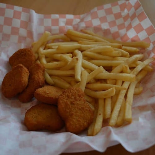 Six Chicken Nuggets & Fries.