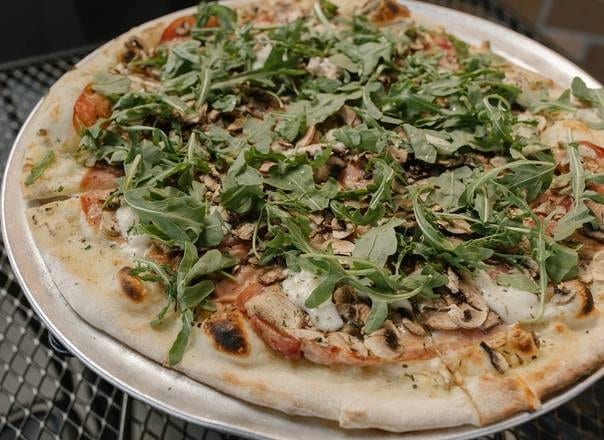 Prosciutto Arugula Pizza.