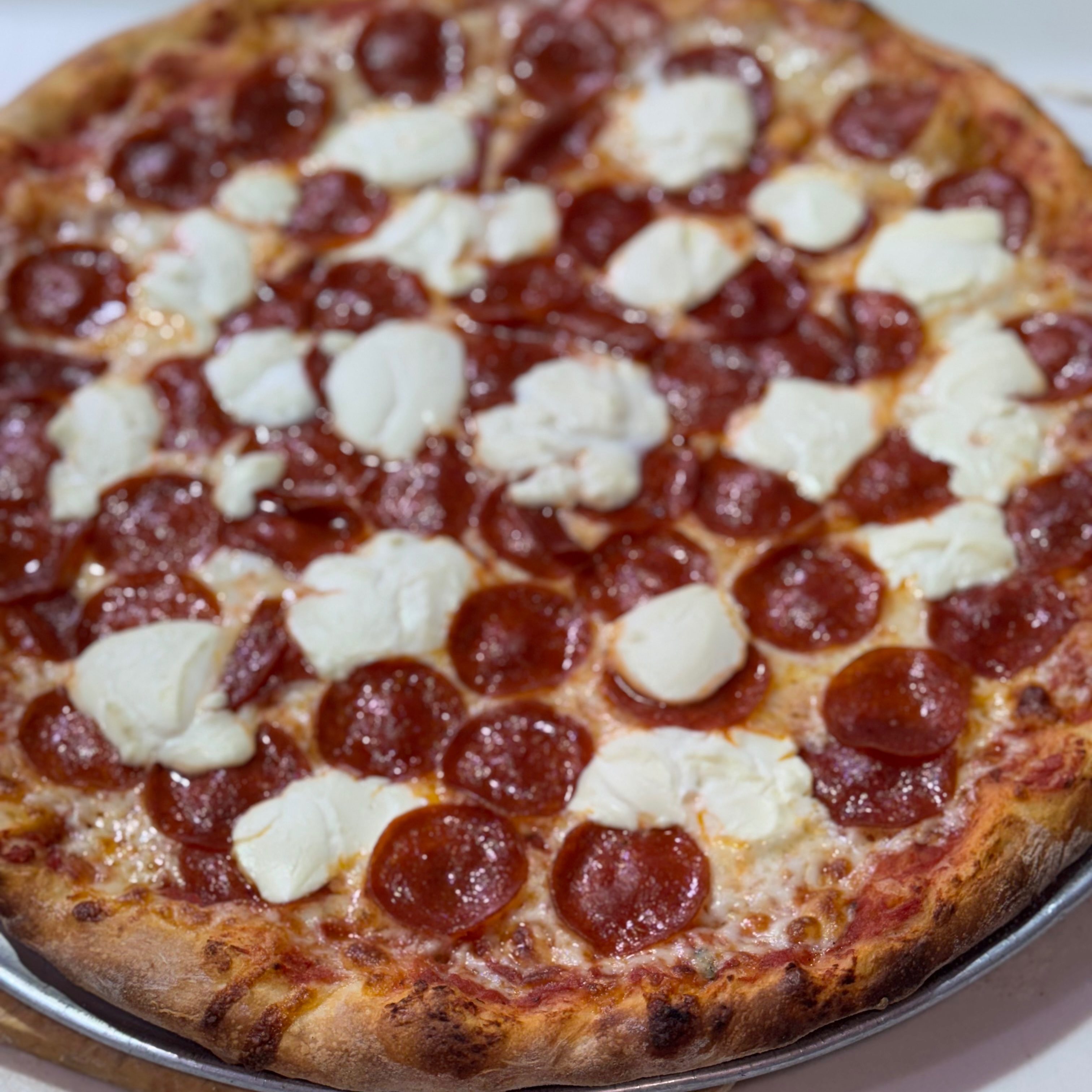 Pepperoni, ricotta and mikes hot honey pizza.
