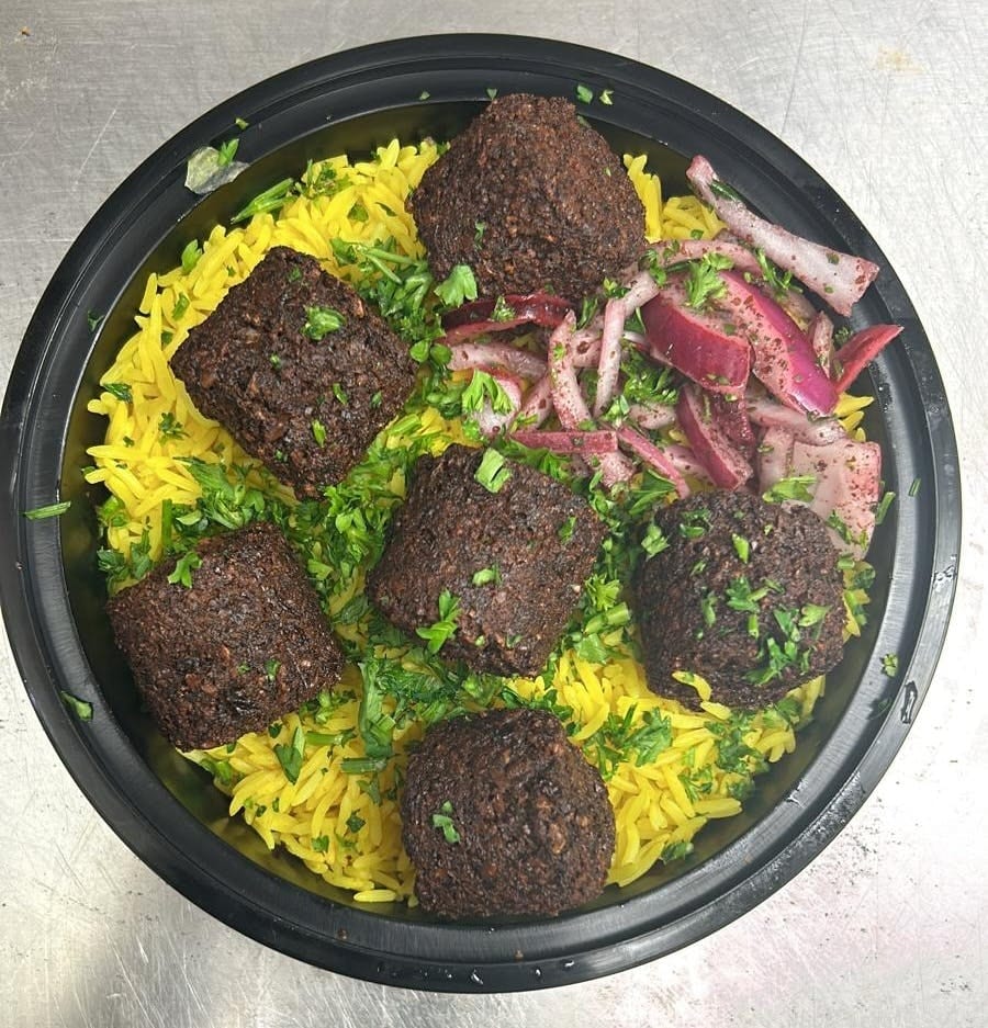 Falafel on Rice with Salad & Soda.