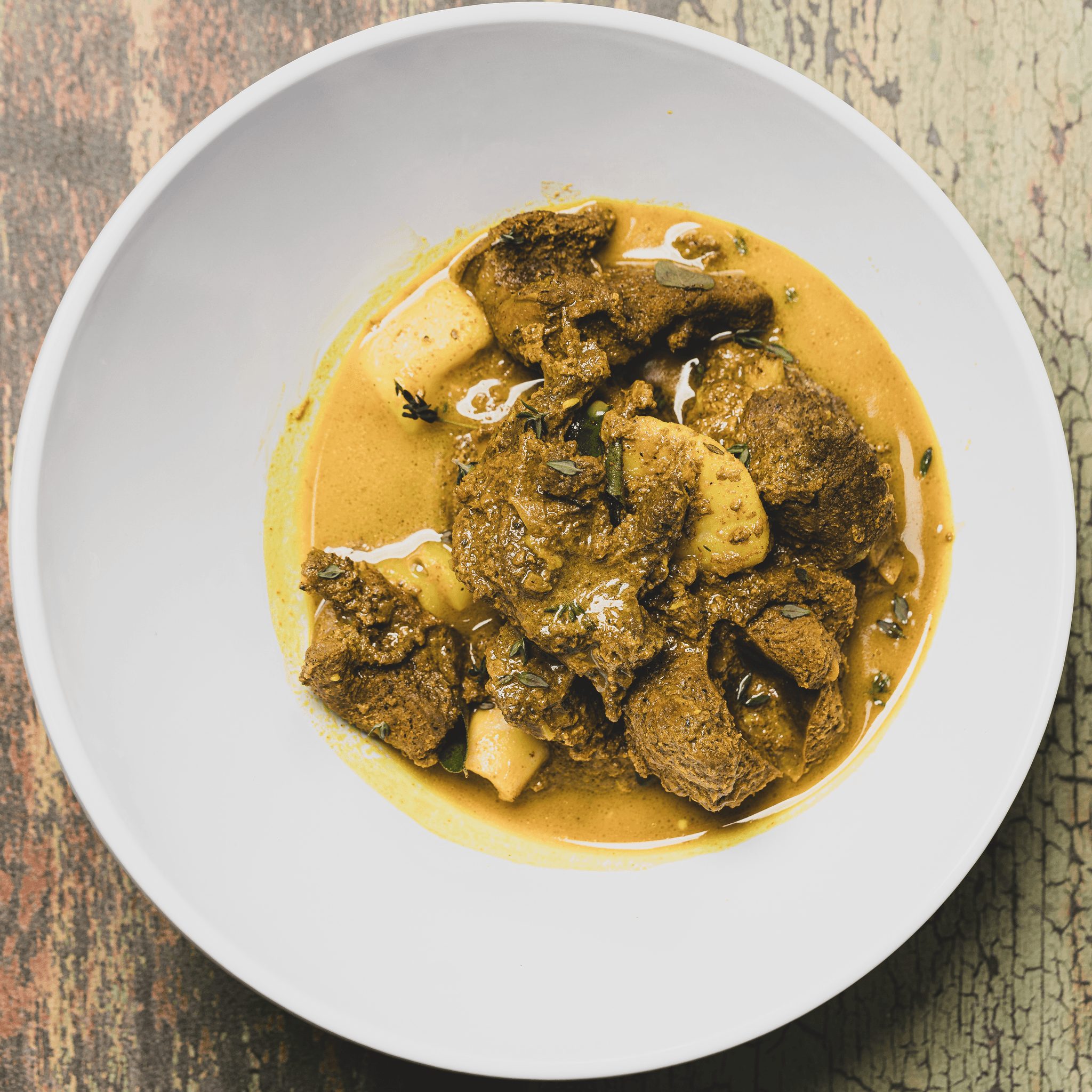 Curry Goat a La Carte.