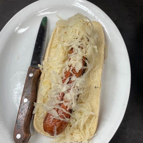 Kraut Dog served with Cottage Fries.