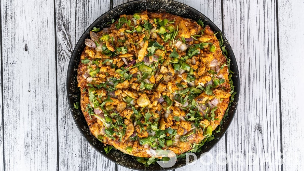 Achari Chicken Pizza.