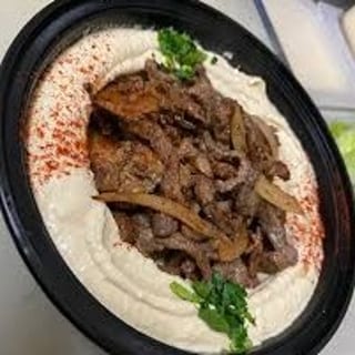 Hummus topped with Beef