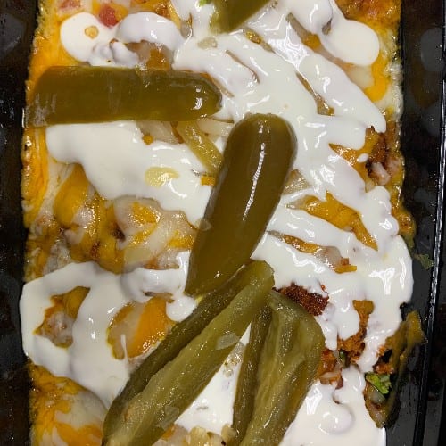 NACHOS WITH CHORIZO.