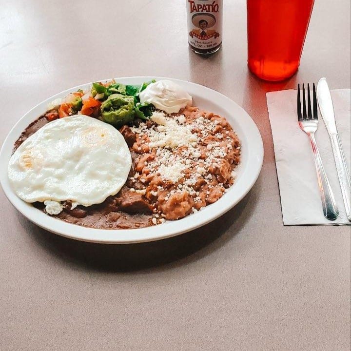 2 Eggs with either Pork Chile Verde or Chile Colorado.