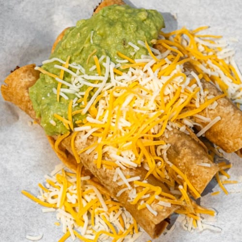 Combo #9. Three Big Burro Rolled Tacos Plate.