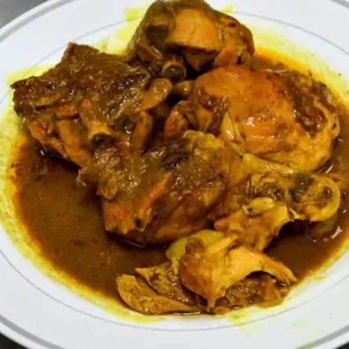 2- Curry Chicken with Jasmine Rice Cabbage and Plantains.