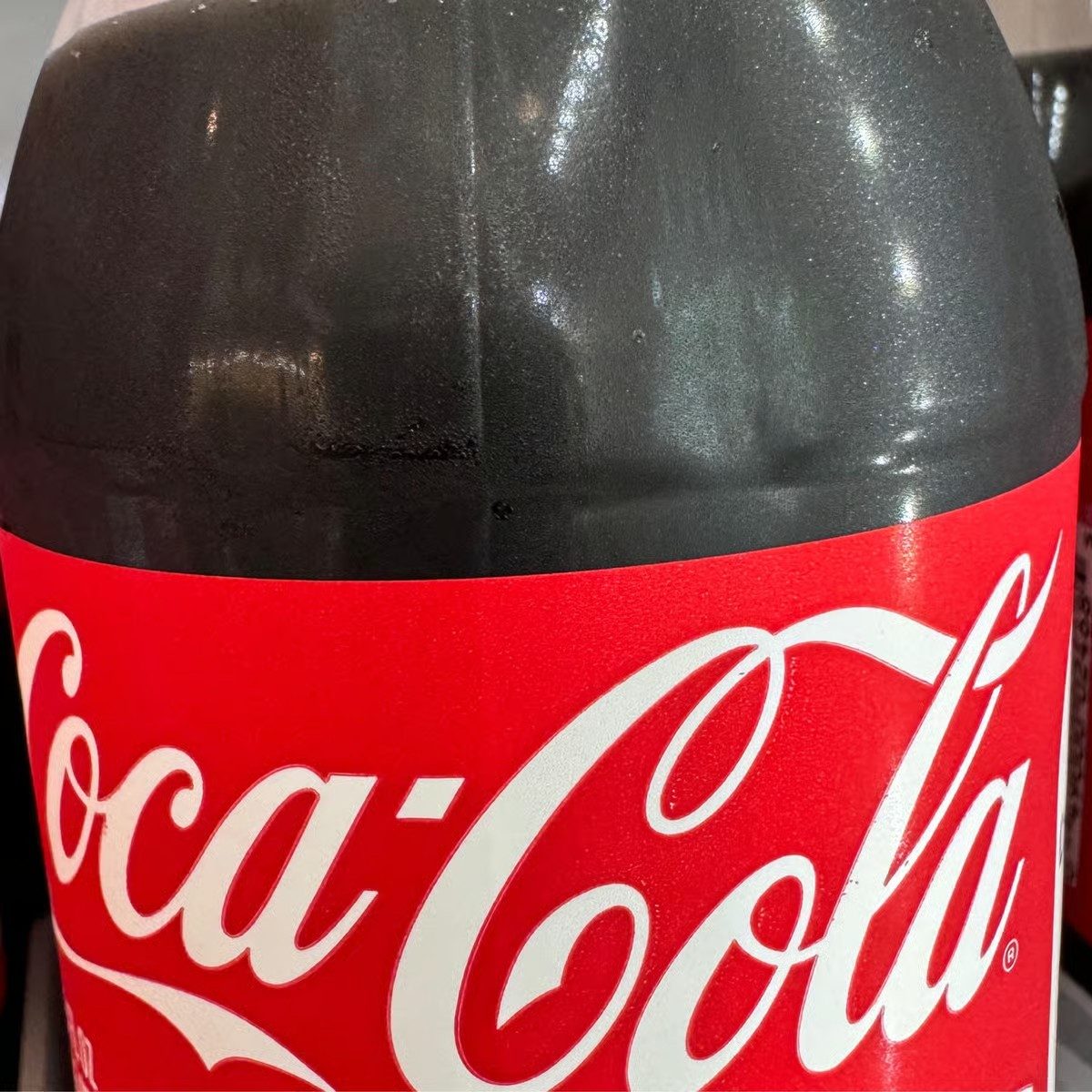 Coke Regular Bottle.