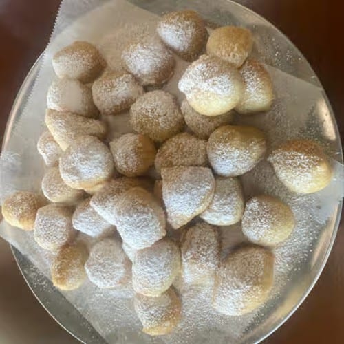 Zeppoli (12) with Vanilla Ice Cream.