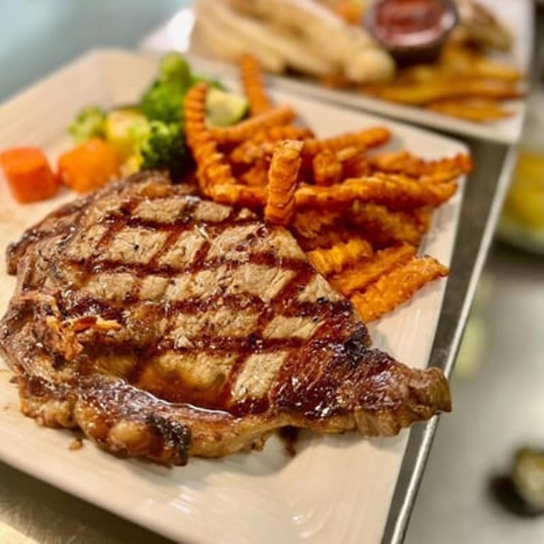 Savor the Perfection of Our Hand-Cut Ribeye!