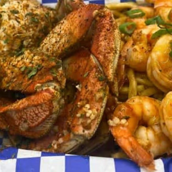 "California Love" Crab & Shrimp with Garlic Noodles.