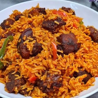Nigerian Jollof Rice with goat meats.