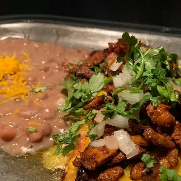 Al Pastor Enchiladas.