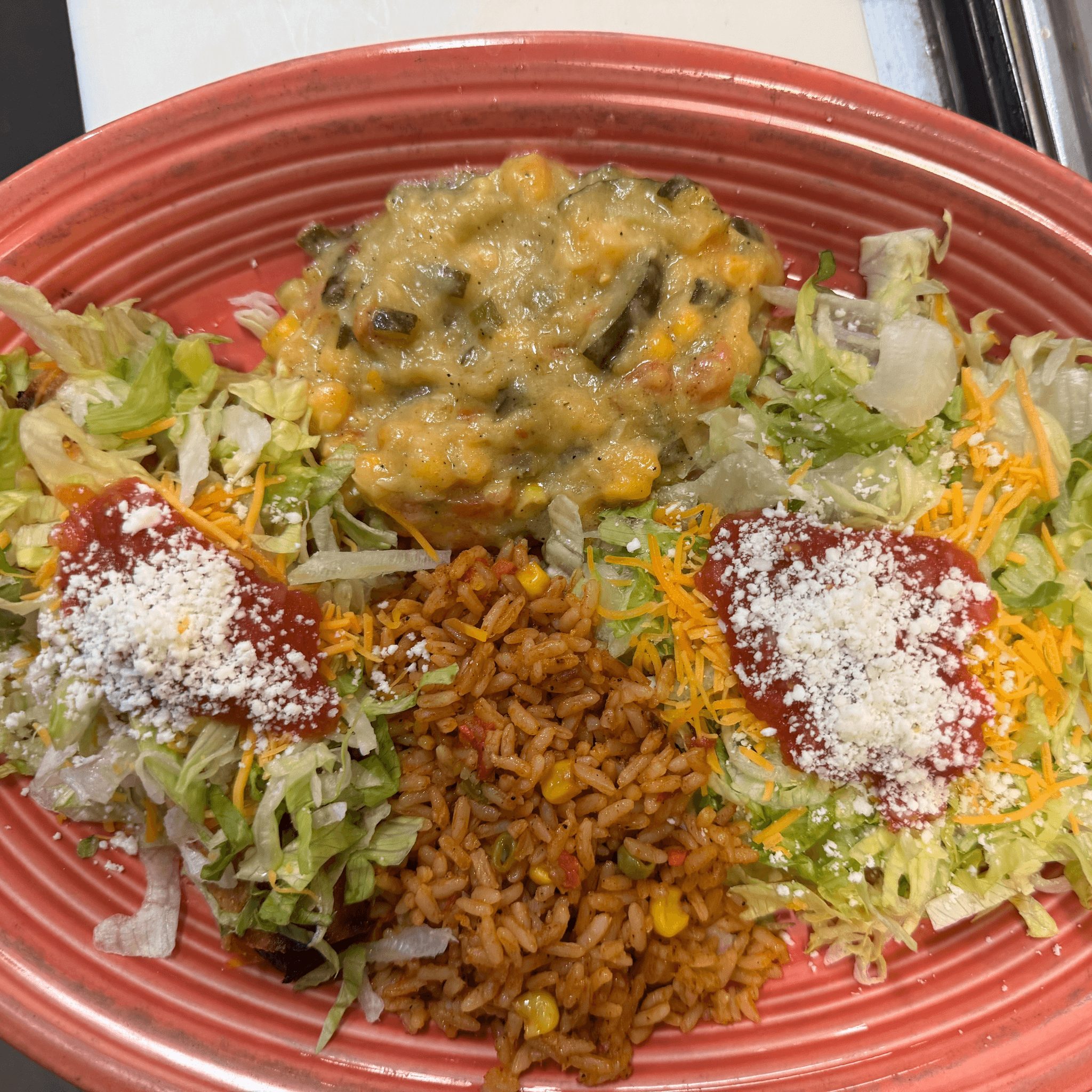 One Bean & Cheese Tostada with a Choice of One Fried Taco.