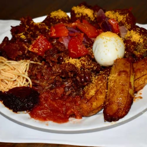 Waakye with Chicken.