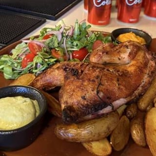 Pollo a la leña